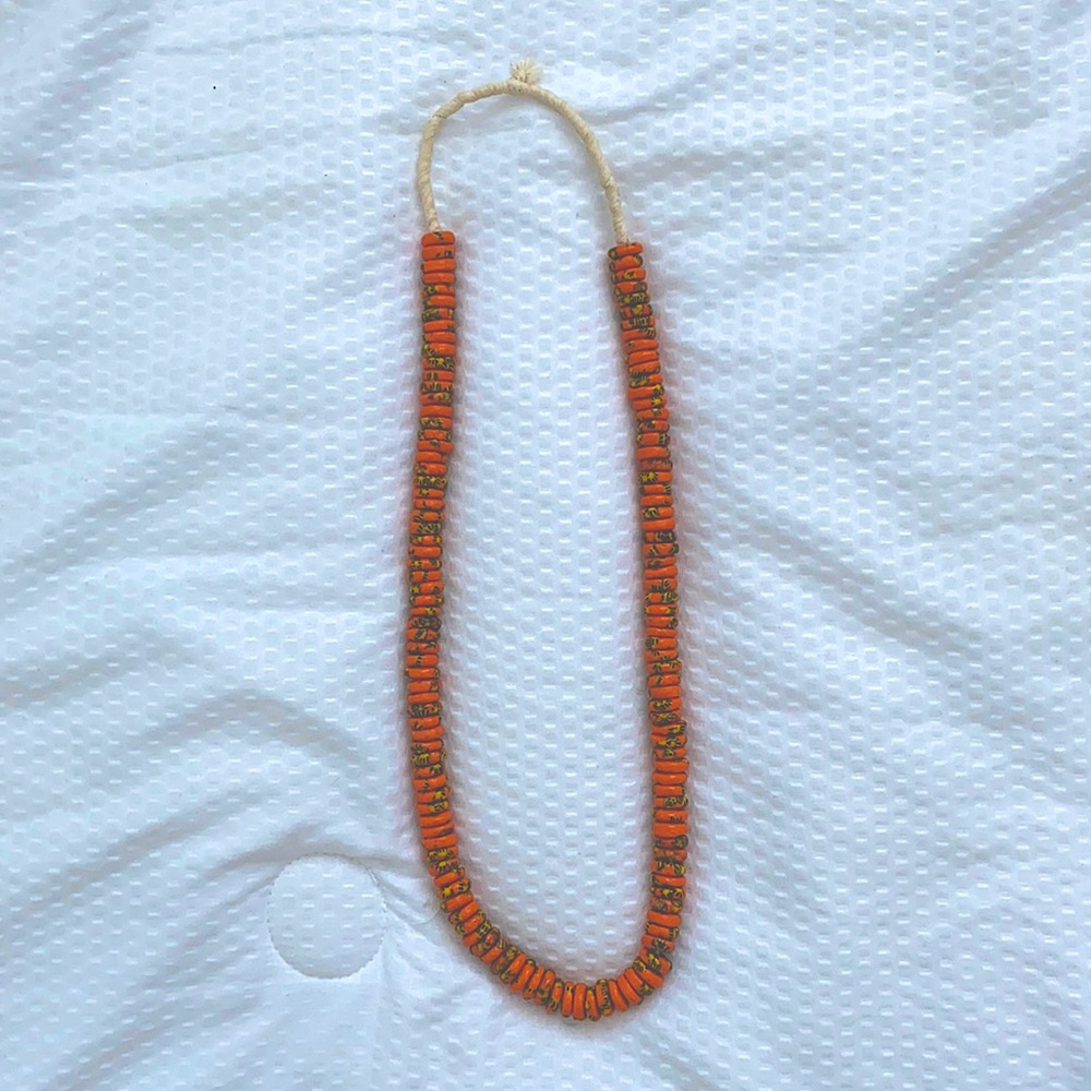 Anthropologie orange beaded necklace with yellow details 🐝
